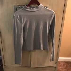 Cropped grey long sleeve shirt